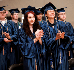 Graduates clapping and happy 